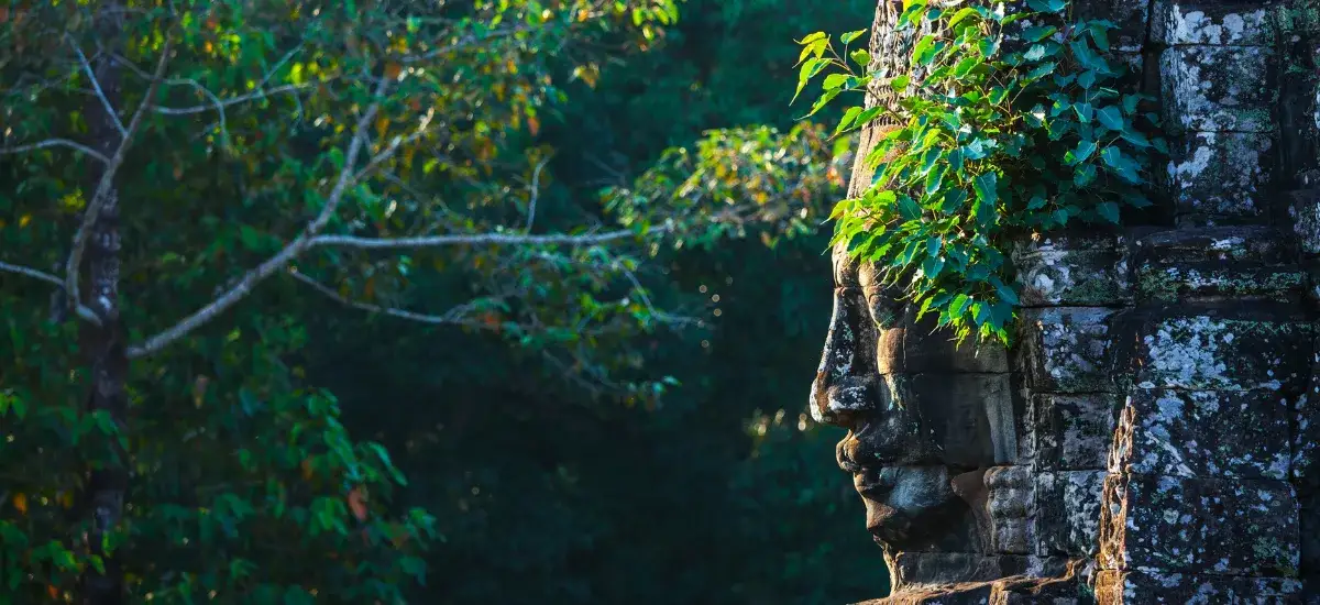 Face of Bayon Temple, Cambodia: Cheapest Countries to Visit from India for Budget Travellers